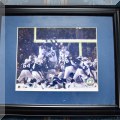 C12. Patriots Snow Kick framed photo with hologram. 